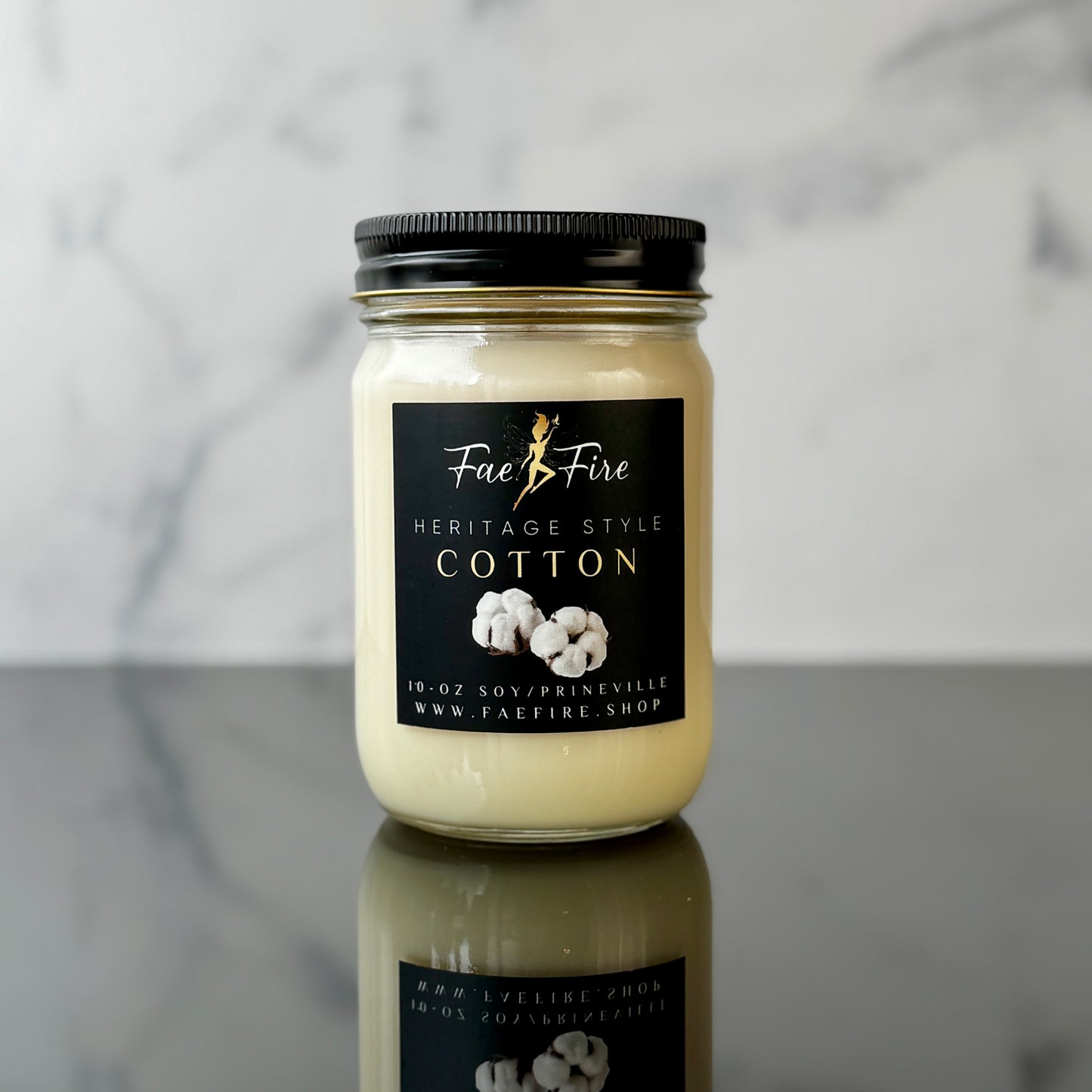 Primary Image: "Heritage Collection Clean Cotton white soy candle in glass jar with black metal lid"
Lifestyle Image: "Clean Cotton luxury candle creating fresh laundry ambiance in modern home setting"
Detail Shot: "Detailed view of Clean Cotton candle showing pure white wax and premium packaging"