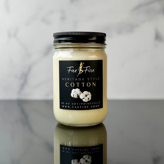 Primary Image: "Heritage Collection Clean Cotton white soy candle in glass jar with black metal lid"
Lifestyle Image: "Clean Cotton luxury candle creating fresh laundry ambiance in modern home setting"
Detail Shot: "Detailed view of Clean Cotton candle showing pure white wax and premium packaging"